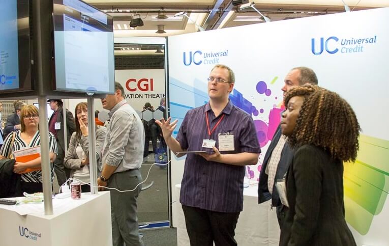 A group of civil servants looking at a Universal Credit demonstration.